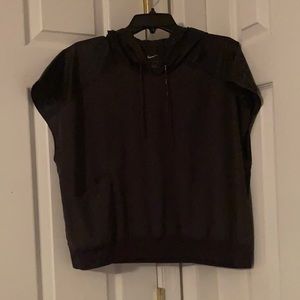 Nike woman’s lightweight short sleeve Rain Jacket - Size M